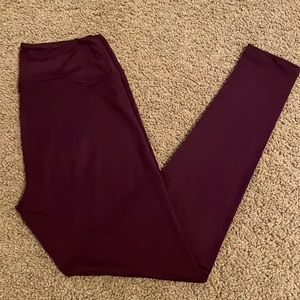 NWOT LuLaRoe plum color buttery soft leggings.  OS